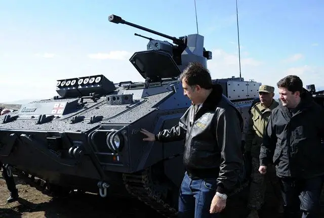 Georgia unveils February 25, 2012, a local made Tracked Inrfantry Combat vehicle "Lazika" at the Vasiani military firing-range. The Georgian President and Defence Minister drove a few kilometers in a new armored vehicle along with military servicemen. 