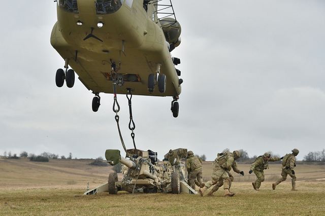 U.S. Soldiers, assigned to Cobra Battery, Field Artillery Squadron, 2nd Cavalry Regiment, conduct Sling Load Operations with support from the 12th Combat Aviation Brigade during Exercise Dynamic Front II at the 7th Army Training Command's Grafenwoehr Training Area, Germany, March 9, 2017.