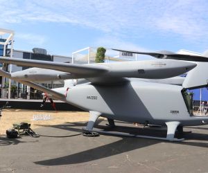U.S. Beta Defense unveils the MV250 hybrid-electric VTOL multi-mission utility aircraft at the Farnborough International Airshow 2026. Designed for autonomous logistics and distributed military operations, the aircraft combines long-range vertical flight, a 2,000-pound (907 kg) payload capacity, hybrid-electric propulsion, and rapid mission reconfiguration for future expeditionary forces. (Picture source: Army Recognition Group)