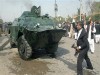 Pakistani BRDM-2 wheeled armoured personnel carrier picture . Pakistani lawyers attack an armored car BRDM-2 as they demonstrate against Pakistan's military ruler President Gen. Pervez Musharraf in Peshawar, Pakistan on Saturday, Oct. 6, 2007. Lawmakers were voting Saturday in a presidential election that Musharraf is expected to sweep, although he could yet face disqualification by the Supreme Court.