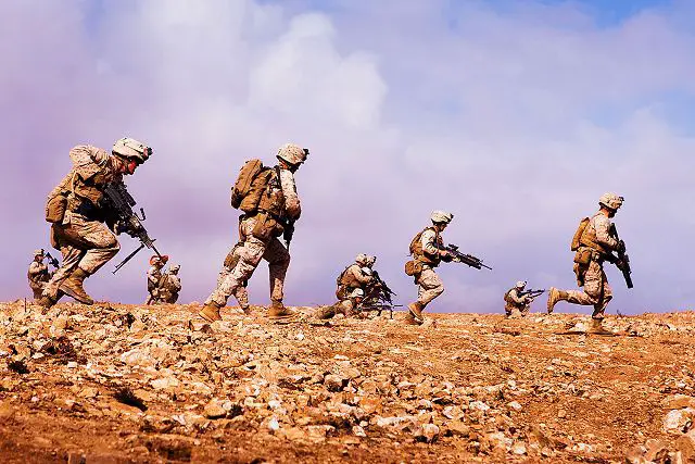 Marines of 1st Battalion, 2nd Marine Regiment, Battalion Landing Team, 24th Marine Expeditionary Unit assault an objective during a rehearsal of the final exercise 