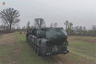 Hwasong 18 ICBM three stages solid fueled intercontinental ballistic missile North Korea front view 001
