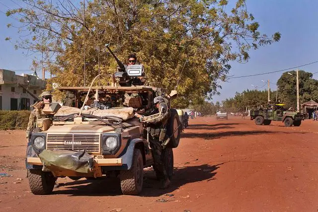 French Army Special Forces soldiers drive through the town of Markala, about 275 km from the capital Bamako, January 15, 2013, to meet Malian soldiers and organize a counter-attack in the jihadist-held town of Diabaly.