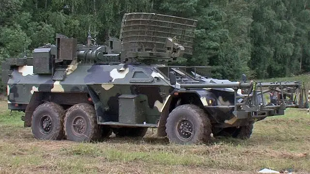 The Russian military will next year unveil initial prototypes of robotic combat vehicles featuring tank-like tracked chassis and hybrid engines, a deputy defense minister said Wednesday, August 8, 2013. Russian defense industry has completed the test program at a military proving ground near the town of Krasnoarmeisk of the Listva remote-controlled mine-clearing vehicle.