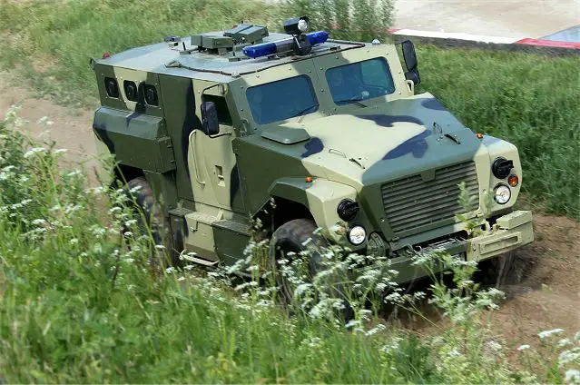 Russia's Interior Troops, whose duties include dispersing mass protests, will switch to a new type of armored vehicle that allows for swift deployment, the force’s commander said on Tuesday, January 31, 2012. The majority of the Interior Troops’ armored personnel carriers are tracked vehicles that require special permission from traffic police to travel city streets. But a new, lighter and wheeled vehicle, SPM-3 Medved (“The Bear”), is currently in testing.