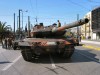 Hellenic Army Greece Leopard 2A6 HEL main battle tank picture . The 25th armoured brigade of the Greek armed forces has put the first LEOPARD 2A6 HEL supplied by Krauss-Maffei Wegmann (KMW) into service. In addition to the 170 main battle tanks Leopard 2A6, Krauss-Maffei Wegmann supplied Greek armed forces with armoured recovery vehicles, armoured vehicle launched bridges, drivinbg and shooting simulatores, as well as the world's most advanced simulation center. The contract was worth 1.7 billion euros. On March 2008, the Greek national holiday commemorating the 1821 revolution, the armed forces presented the LEOPARD 2A6 HEL to the public at a parade in Athens. 