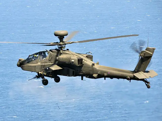 An Apache attack helicopter fires its 30mm cannon at sea, in exercise ranges off Gibraltar