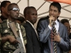 Madagascar's opposition leader Andry Rajoelina addresses his supporters during a rally in Antananarivo March 14, 2009. Rajoelina emerged from hiding on Saturday to tell thousands of his supporters he was giving President Marc Ravalomanana four hours to step down. Madagascan soldiers gather outside Defence Minister Mamy Ranaivoniarivo's office in the capital Antananarivo.