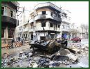 The Syrian army in Homs may not be in full control but soldiers are heavily present in the city’s main squares. A picture taken in the city of Homs shows a BMP-1 armoured infantry fighting vehicle of the Syrian army destroyed by the rebels.