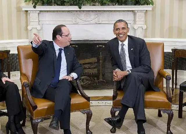 Visiting French President Francois Hollande said at the White House on Friday that he stood by the pledge to withdraw French forces from Afghanistan by the end of 2012. "I recalled to President Obama that I had made a promise to withdraw our combat troops from Afghanistan at the end of 2012," Hollande said after meeting with U.S. President Barack Obama. 