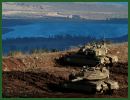 Israel's army fired tank shells that struck a Syrian armored unit after a mortar shell exploded near an army post in the Golan Heights Monday, November 12, 2012, officials said. It was the second time in 24 hours Israel fired back after stray mortar shells came from Syria, an army statement said.