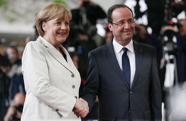 German Chancellor Angela Merkel and French President Francois Hollande held talks in the southwestern German town of Ludwigsburg on Saturday to mark former French president Charles De Gaulle's speech, while the EADS/BAE merger and eurozone banking union weigh heavily on the agenda of the largely ceremonial meeting.