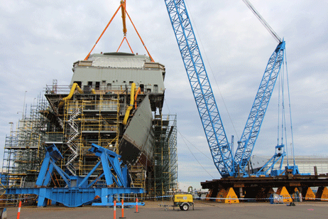 The Bridge for the first destroyer that is under construction as part of the Air Warfare Destroyer (AWD) project was this week lifted onto the ship structure. The AWD Alliance completed this work on Wednesday morning. The block is a combination of two smaller blocks constructed by lead shipbuilder ASC and weighing more than 200 tonnes, it is the biggest to be added to the ship structure to date. 