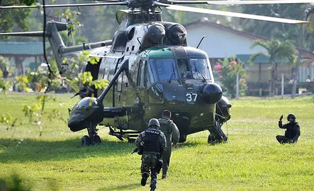 An air, ground assault and mortar attacks were launched by Malaysian armed forces, killed at least 13 of the nearly 200 militants seeking to reclaim part of Borneo Island for a Filipino sultan, Malaysian police officials said Wednesday, March 6, 2013