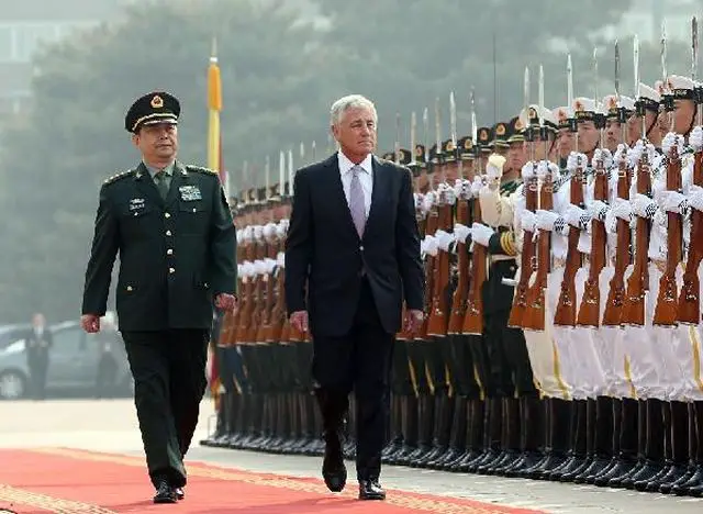 Chinese Defense Minister Chang Wanquan held talks with his U.S. counterpart Chuck Hagel on promoting the sound and stable development of a new type of military relations. Chang said this year marks the 35th anniversary of the establishment of bilateral relations, and it is also a crucial year for the two sides to build the new type of major-country relations.
