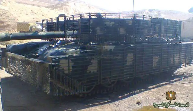 Tank crews of the Syrian army use T-72 main battle tank especially upgraded for urban warfare. A photo released on Internet show a Syrian army T-72M1 main battle tank fitted with new wire cage armor to increase protection against anti-tank guided missiles and rocket-propelled grenades.