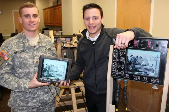 Assistant Product Manager Maj. Curtis Brooker and Common Remotely Operated Weapons Station, or CROWS, Engineer Matthew Moeller demonstrate the second screen option developed at Picatinny Arsenal, N.J. Army