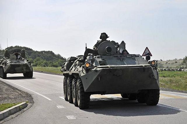 Russia continues to build up its military presence in close proximity to the border with Ukraine, National Security and Defense Council (NSDC) spokesman Andriy Lysenko has said, on Thursday, July 24, 2014. Lysenko also said that in a forest not far from the villages of Churovichi, Zeleny Kut and Rudnya-Tsata in the Bryansk region, ten kilometers from the border with northern Ukraine, Russia continued to equip camouflaged firing positions of infantry fighting vehicles.