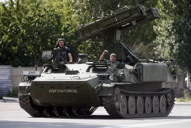 According Reuters, Ukrainian separatists killed 23 Ukrainian soldiers and wounded nearly 100 in a missile attack on Friday, July 11, 2014. A picture released on Reuters website shows Pro-Russian separatist fighters with 9K35 Strela 10 (NATO code SA-13 Gopher) short-range surface-to-air defense missile system.