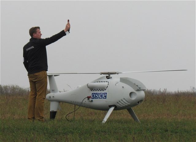 The OSCE (Organization for Security and Cooperation in Europe) Special Monitoring Mission to Ukraine (SMM) October 23, 2014, successfully completed the maiden flight of its unarmed/unmanned aerial vehicles (UAVs) before members of the media near Mariupol in eastern Ukraine. The roll-out of the UAV operations in eastern Ukraine will continue Friday with, weather permitting, routine operational flights.