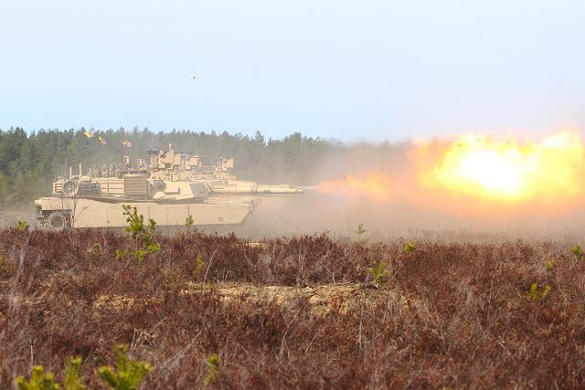 Four M1A2 Abrams Main Battle Tanks conducted a live-fire demonstration for the Lithuanian Minister of Defense, members of the Lithuanian army and civilians showcasing the 120mm main gun, 240B 7.62mm and M2A1 .50 caliber machine guns April 9. 