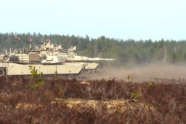 Four M1A2 Abrams Main Battle Tanks conducted a live-fire demonstration for the Lithuanian Minister of Defense, members of the Lithuanian army and civilians showcasing the 120mm main gun, 240B 7.62mm and M2A1 .50 caliber machine guns April 9. 