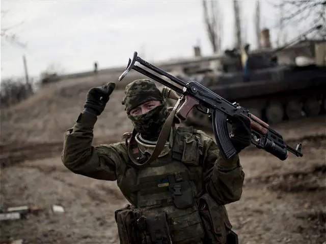Fighting intensified Tuesday, February 10, 2015, in eastern Ukraine as pro-Russia rebels and Ukrainian troops sought to extend their gains ahead of crucial peace talks, and the government accused the separatists of shelling a town far behind the front lines, killing 12 people and wounding scores.