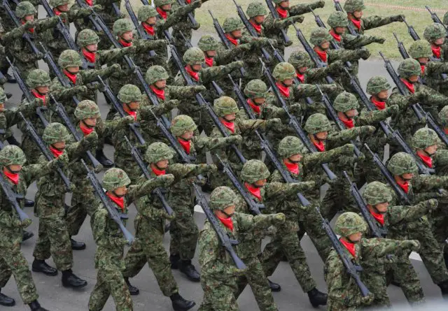 Japan parliamentary committee approved bill to allow country s troops to fight abroad 640 001