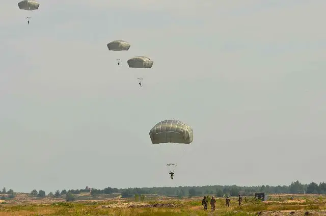 U.S. Army paratroopers with 2nd Battalion, 503rd Infantry Regiment, 173rd Airborne Brigade, along with Polish soldiers from the 6th Airborne Brigade, conducted an airborne training exercise July 18 at the Nowa Deba Training Area in Poland.