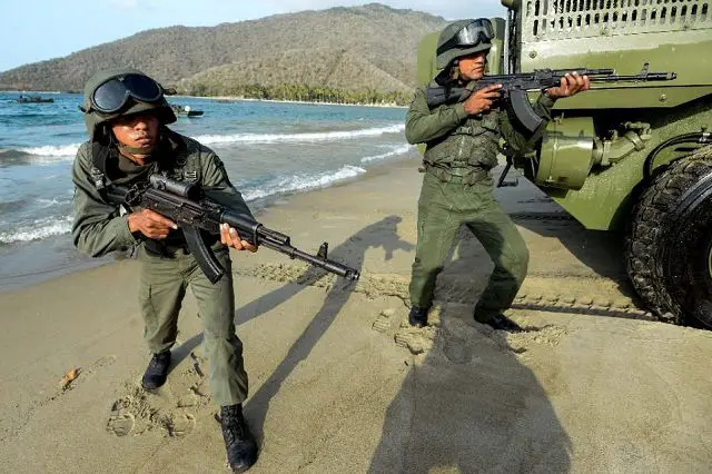 Venezuela Armed forces on Saturday, March 14, 2015, conduct a military exercise to counter an alleged U.S. threat, deploying soldiers and partisans across the country to march, man shoulder-fired missiles and defend an oil refinery from a simulated attack. 