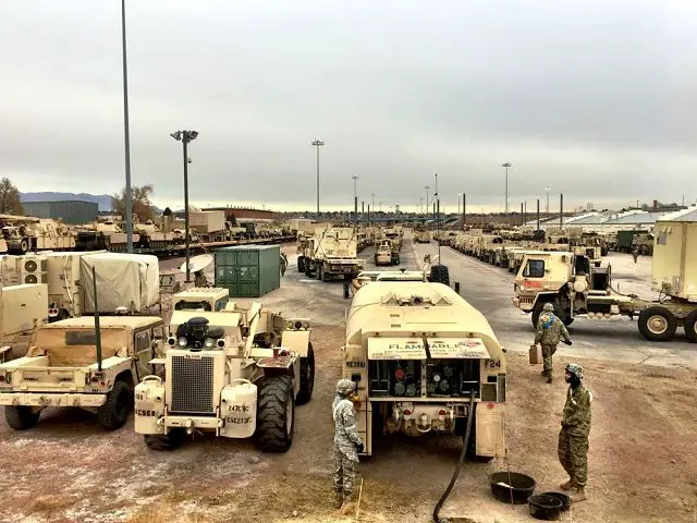 US. soldiers from 3rd Armored Brigade Combat Team, 4th Infantry Division, in Fort Carson, Colorado on the way to load trains with military equipment for a deployment in Europe. In fact, the rail-load operations here concluded nearly a week ahead of schedule in what is the first transportation step toward re-establishing a continuous presence of U.S. Army armored brigade combat teams in Europe.