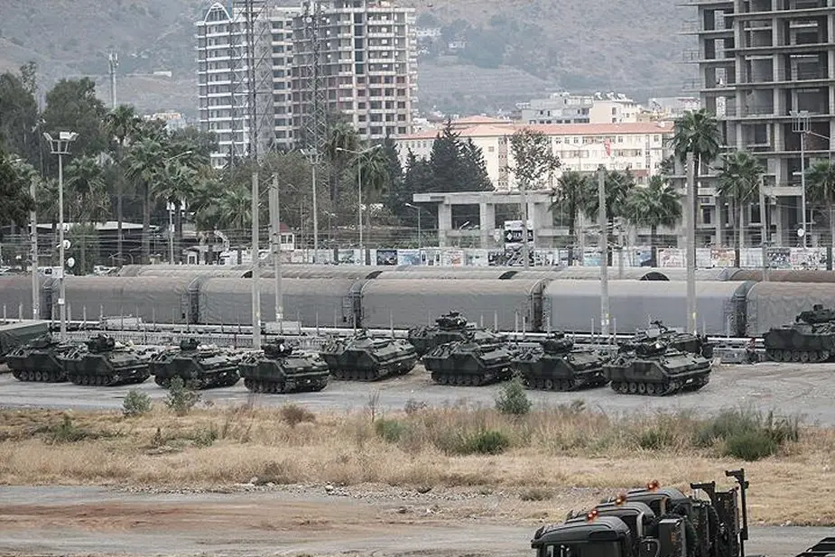Turkey deploys 80 military vehicles along border with Syria 001