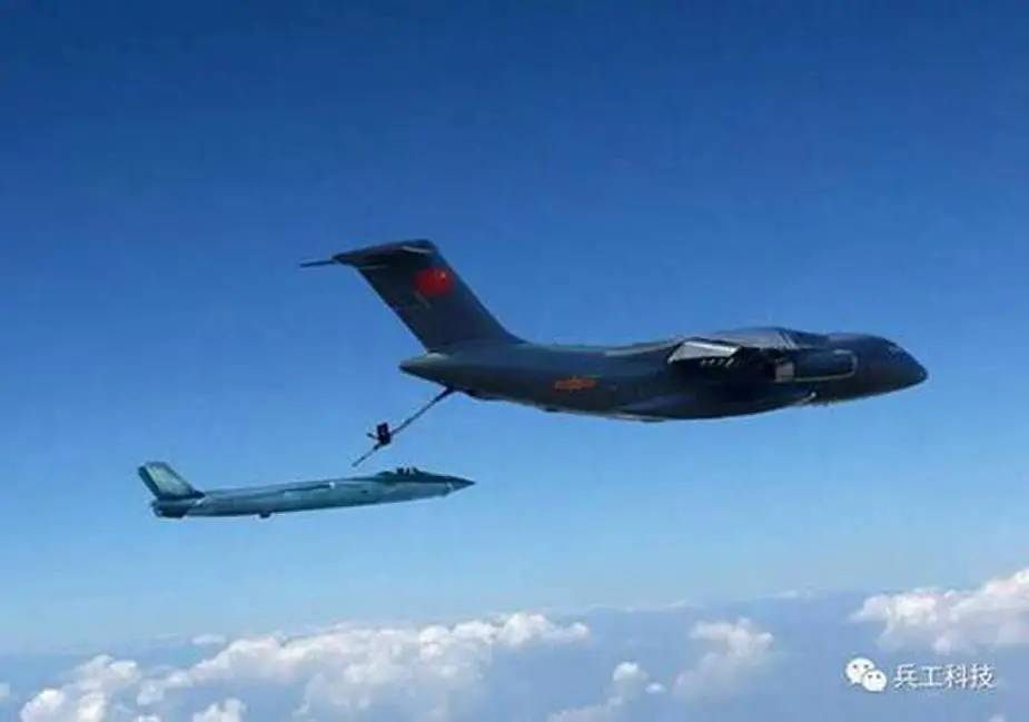 Chinese Air Force YU 20 tanker and Chinese Navy J 15 carrier based fighter achieve first in flight refueling