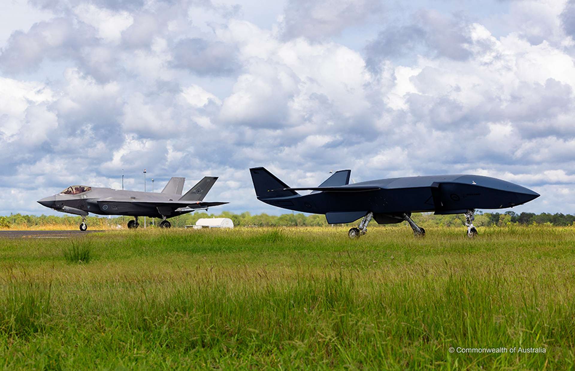 The MQ-28A Ghost Bat is a stealthy long-range collaborative combat drone equipped with modular sensor payloads, AI-driven mission systems, and the ability to launch air-to-air weapons, providing the Royal Australian Air Force with an extended reach for surveillance, electronic attack, and frontline air combat operations (Picture source: Commonwealth of Australia).