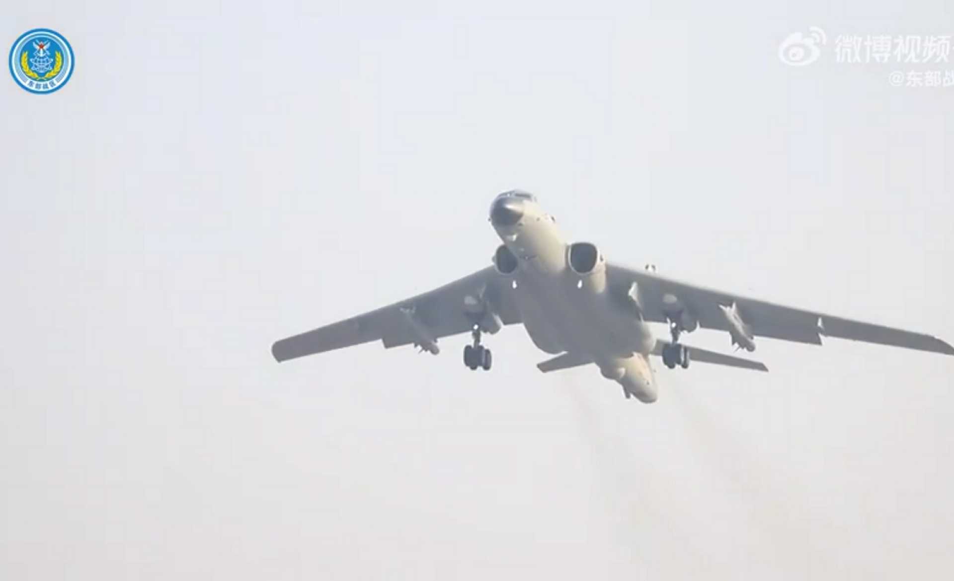 Chinese Air Force H-6 bomber takes off carrying YJ-12 supersonic anti-ship missiles during long-range strike exercises east of Taiwan, as shown in footage released by China on December 29, 2025.