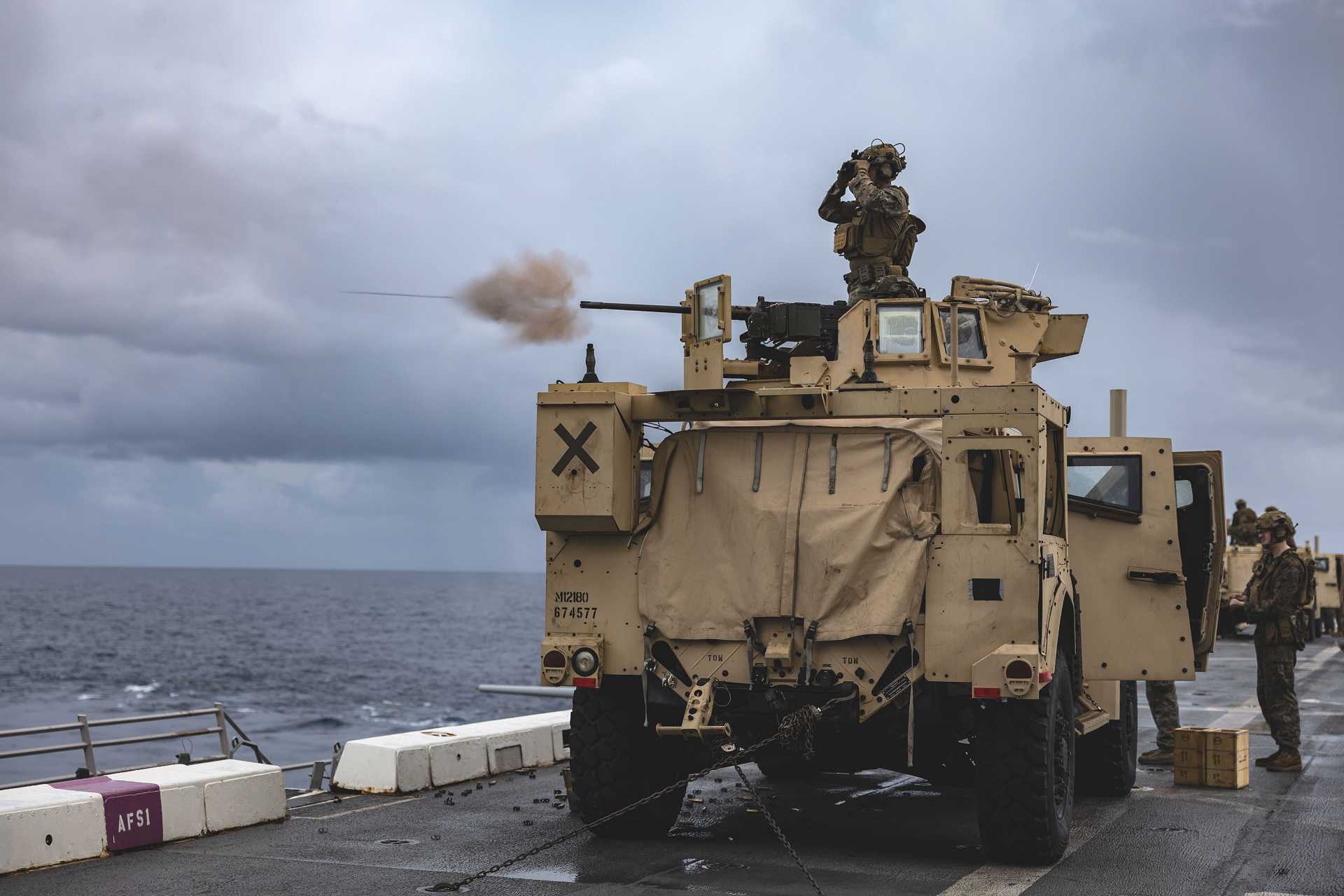 U.S. Marines of the 22nd MEU’s BLT 3/6, Lakota Weapons Company, conduct live-fire training with JLTVs armed with .50 caliber machine guns on the flight deck of USS San Antonio (LPD 17) during operations in the Caribbean Sea.