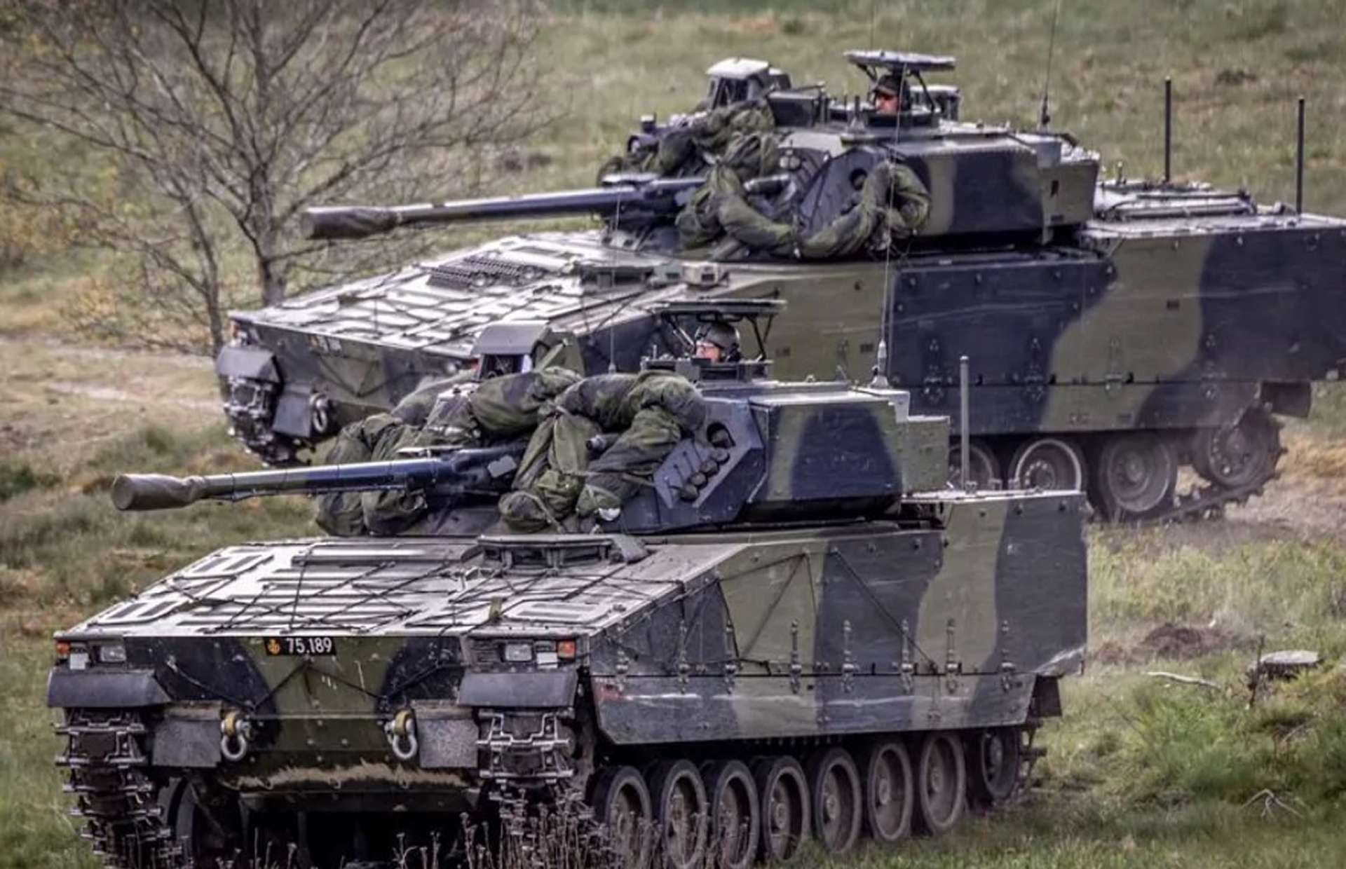 Denmark’s new CV9035 MkIIIC infantry fighting vehicle combines a 35 mm Bushmaster III cannon with advanced thermal sights, digital battle management, strengthened mine and blast protection, and high-mobility Nordic-optimized tracks, giving Danish mechanized forces greater firepower, survivability, and networked battlefield awareness within the future NATO heavy brigade (Picture source: Danish Armed Forces).