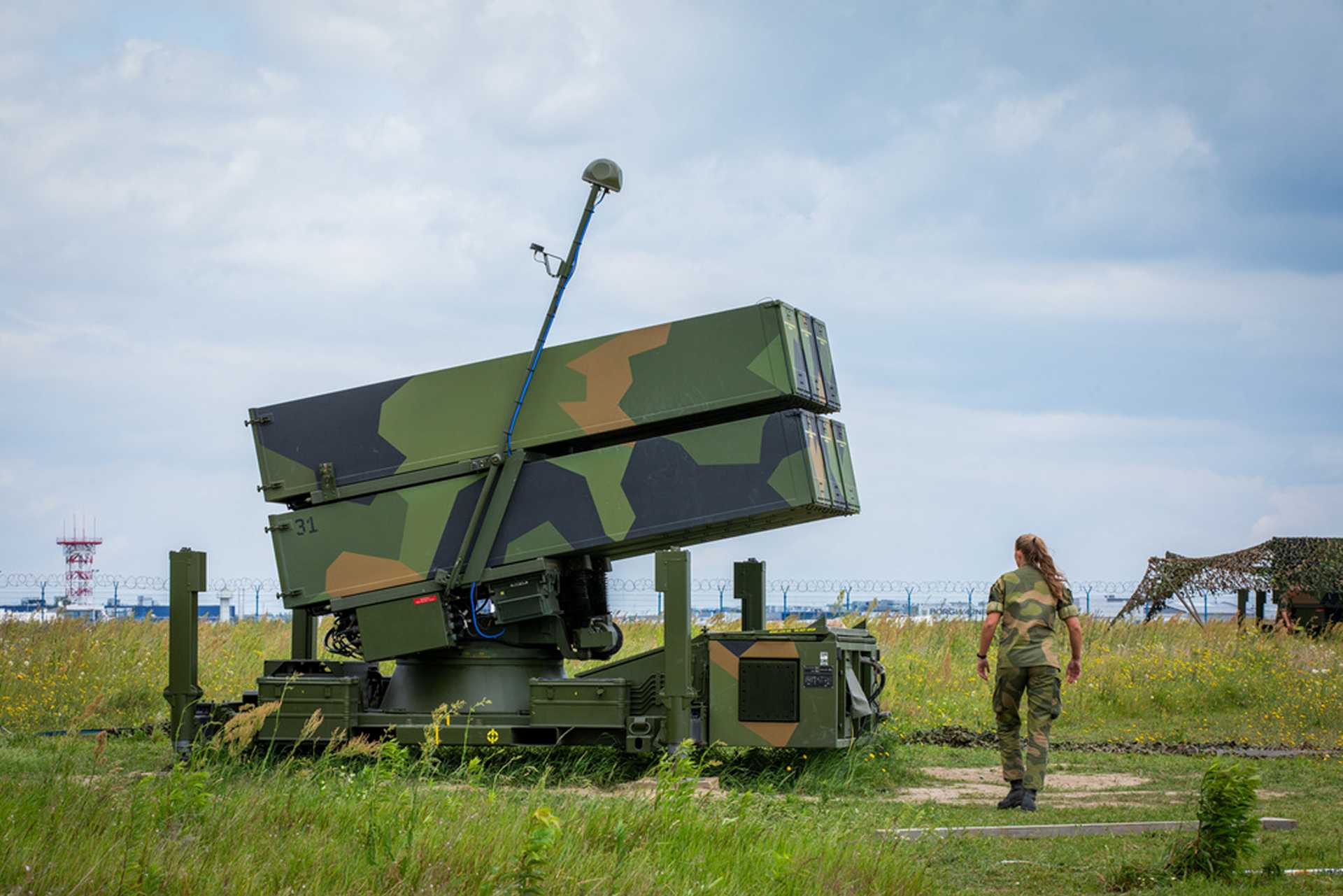 NASAMS medium-range air defense system combines Raytheon radars with Kongsberg fire control and launchers, providing multi-mission capability against aircraft, cruise missiles, and drones.