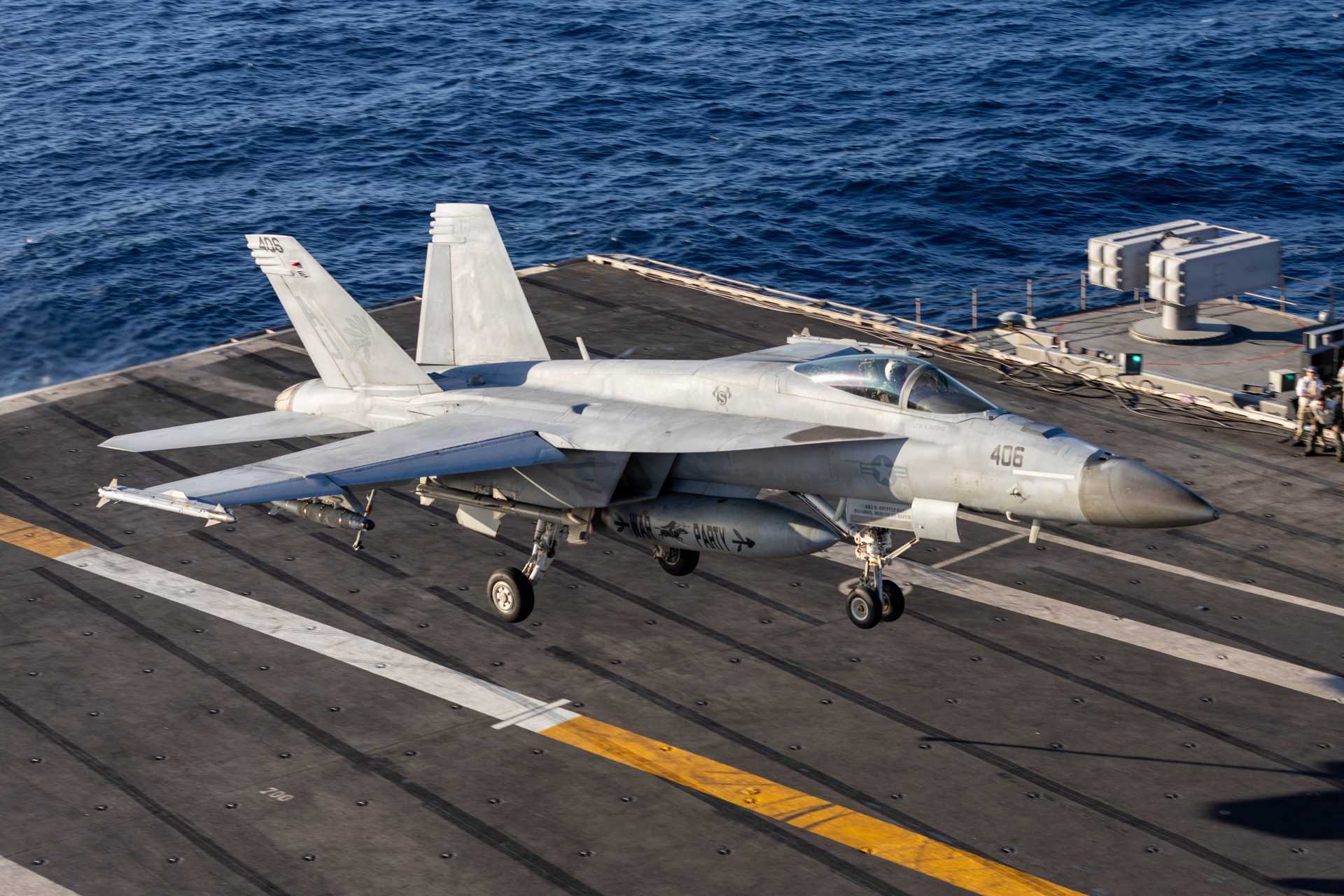 An F/A-18E Super Hornet touches down on the flight deck of the USS Gerald R. Ford (CVN 78), the world’s largest and most advanced aircraft carrier, during operations on November 17, 2025.