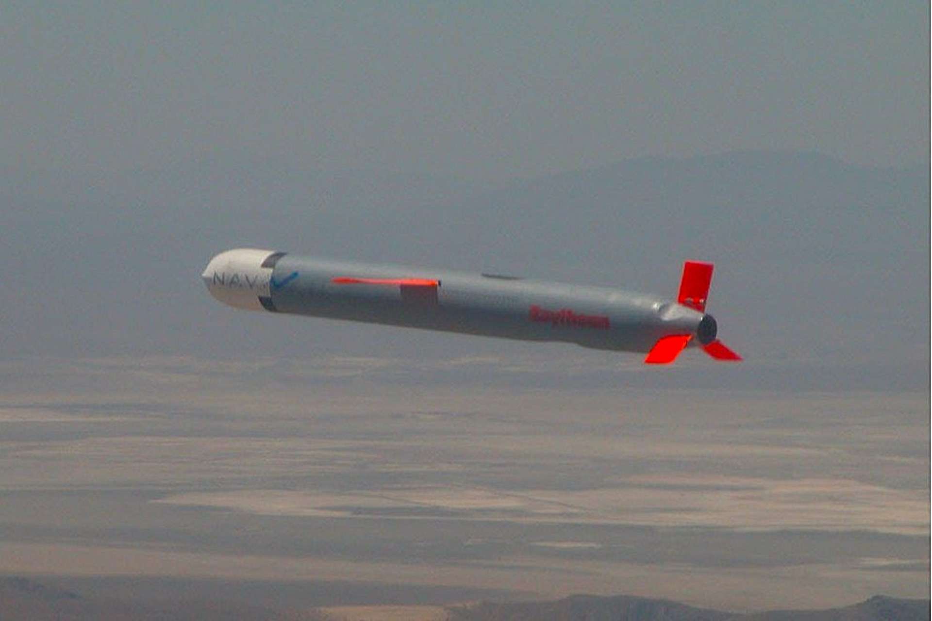 The Tomahawk cruise missile is a long-range, precision-guided weapon capable of striking land targets more than 1,000 miles away with conventional or nuclear warheads, launched from U.S. Navy ships or submarines for deep-strike missions (Picture Source: Raytheon)