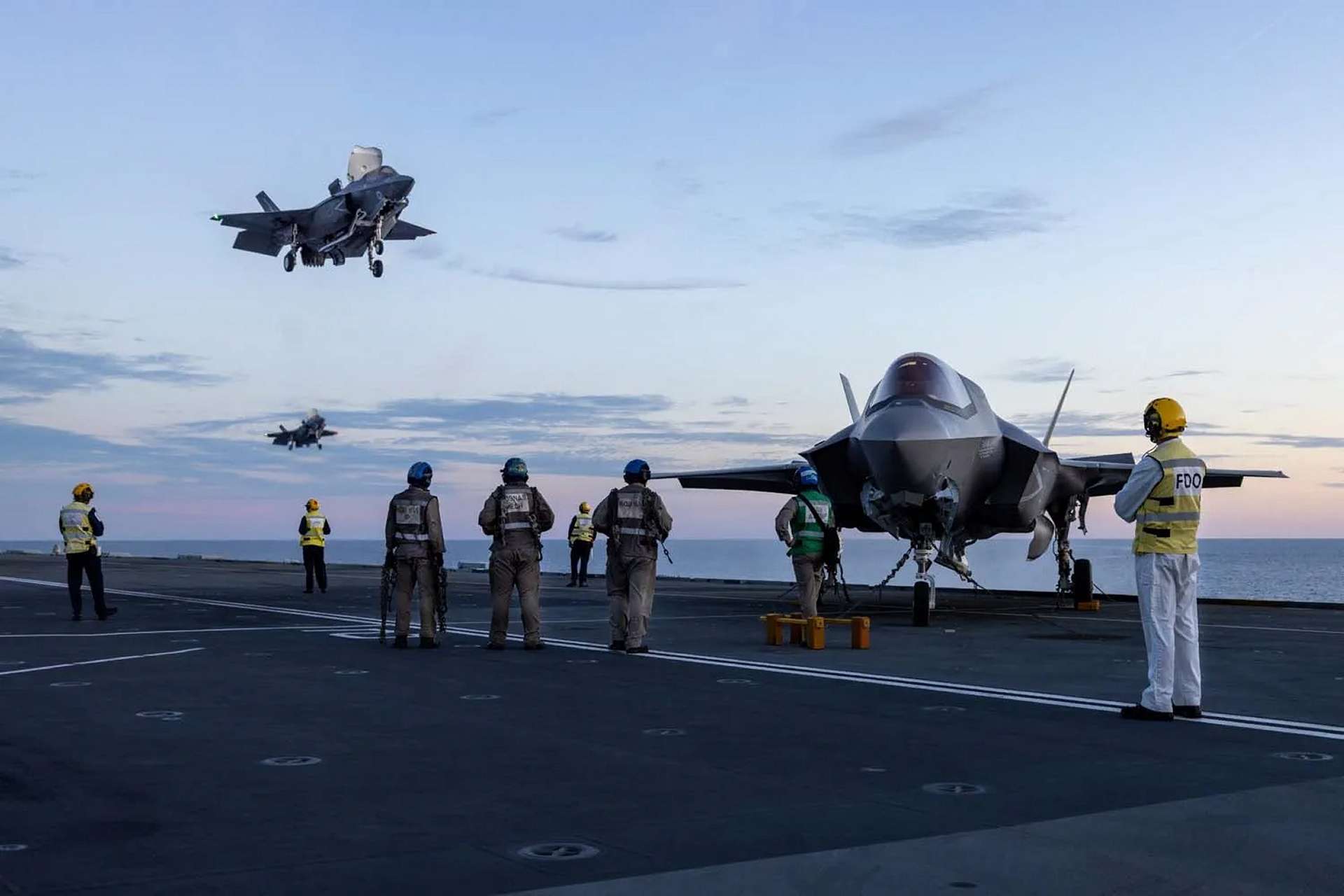 The HMS Prince of Wales is the United Kingdom’s newest aircraft carrier, designed for high‑tempo operations, and it currently hosts the F‑35B Lightning II stealth fighter jets, advanced short‑takeoff and vertical‑landing aircraft that form the core of Britain’s fifth‑generation air power at sea (Picture Source: Royal British Navy)