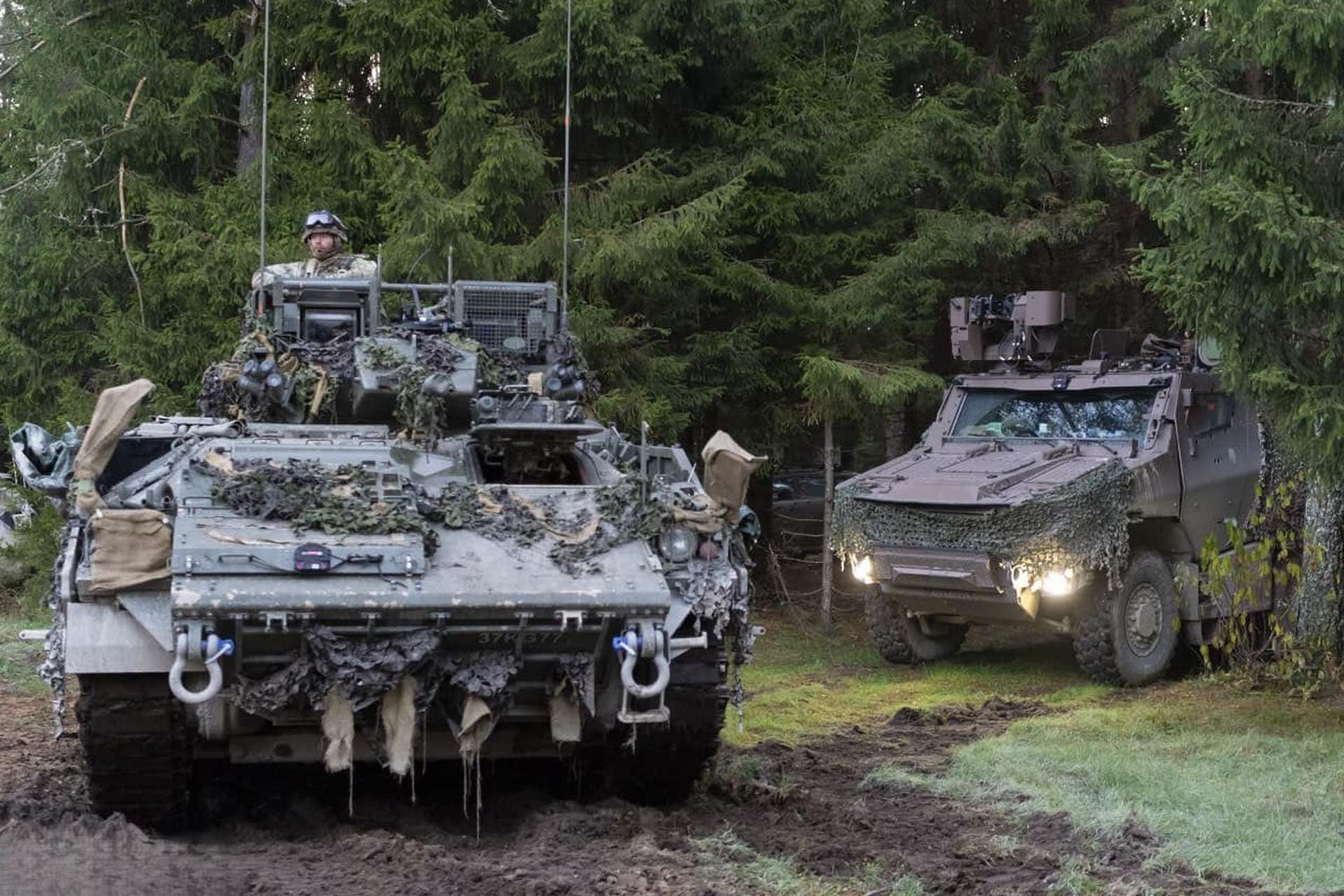 French VBMR Griffon and British Warrior vehicles maneuver side by side across Estonia’s rugged terrain, showcasing digital integration, mobility, and firepower in a joint NATO exercise. British troops equipped with NLAW systems flank the armor, simulating anti-tank tactics against a red-team opposition (French MoD)