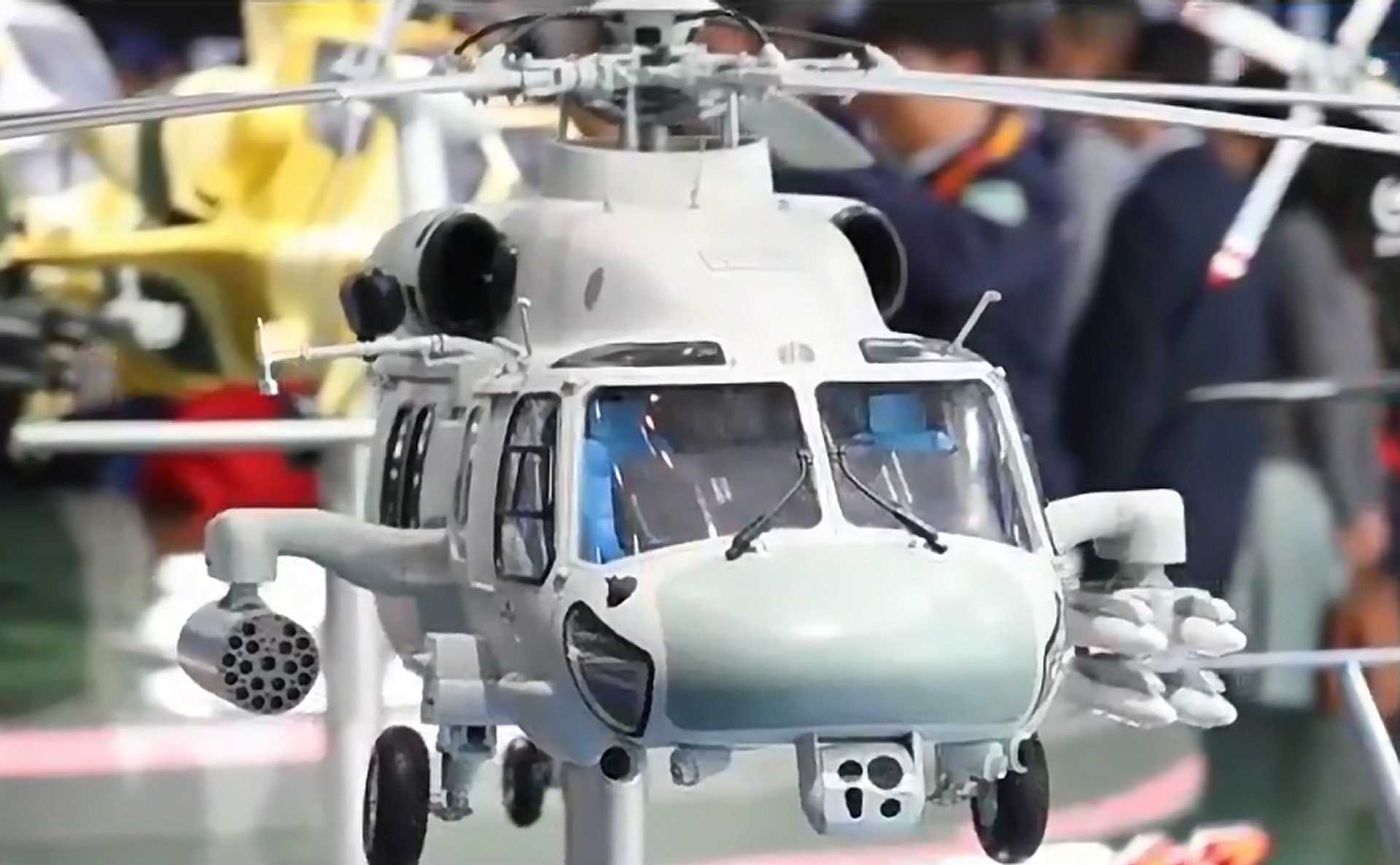 Scale model of China’s newly unveiled Z-20J carrier-based assault helicopter, showcased at the 7th China Helicopter Exposition in Tianjin, highlighting its foldable rotor and tail boom designed for naval deployment aboard PLAN amphibious ships.