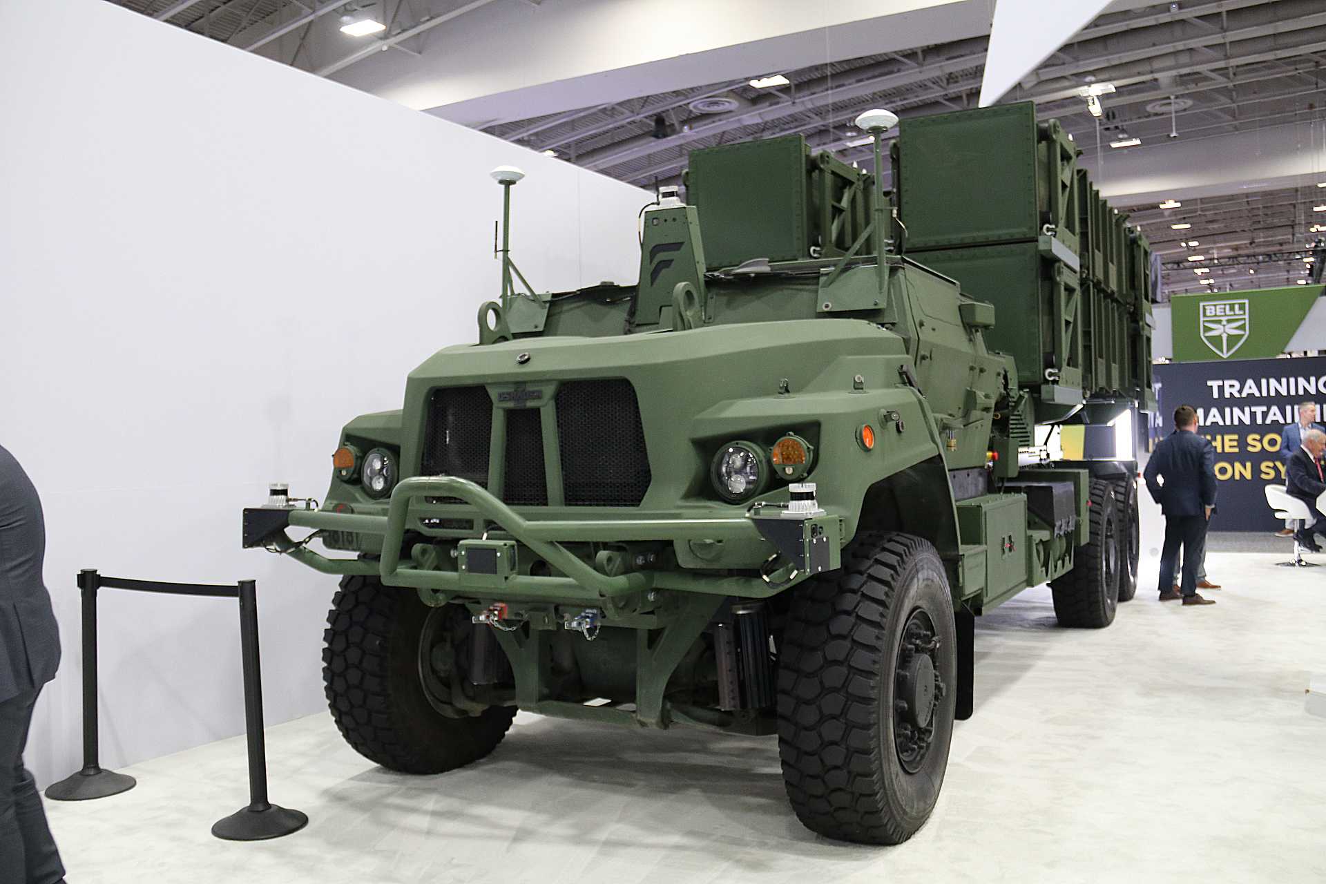 RTX unveils the DeepFires autonomous missile launcher at AUSA 2025, showcasing its dual-role capability with containerized vertical launch cells for Tomahawk and Patriot missiles integrated on a fully unmanned Oshkosh FMTV A2 6x6 chassis.