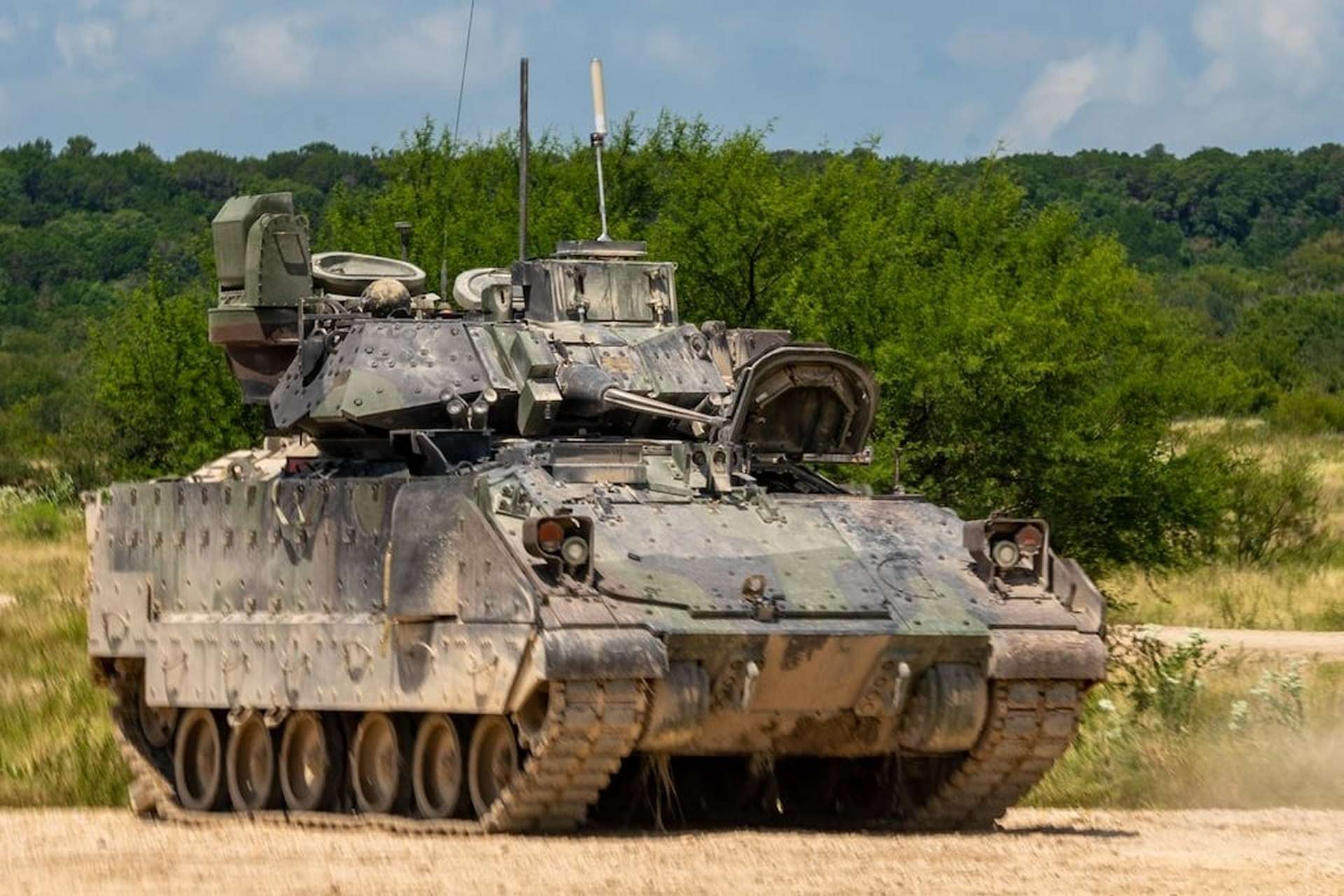 The Bradley Infantry Fighting Vehicle combines mobility, firepower, and protection to transport infantry and support armored operations with its 25mm cannon, TOW missiles, and advanced battlefield sensors (Picture Source: U.S. Army)