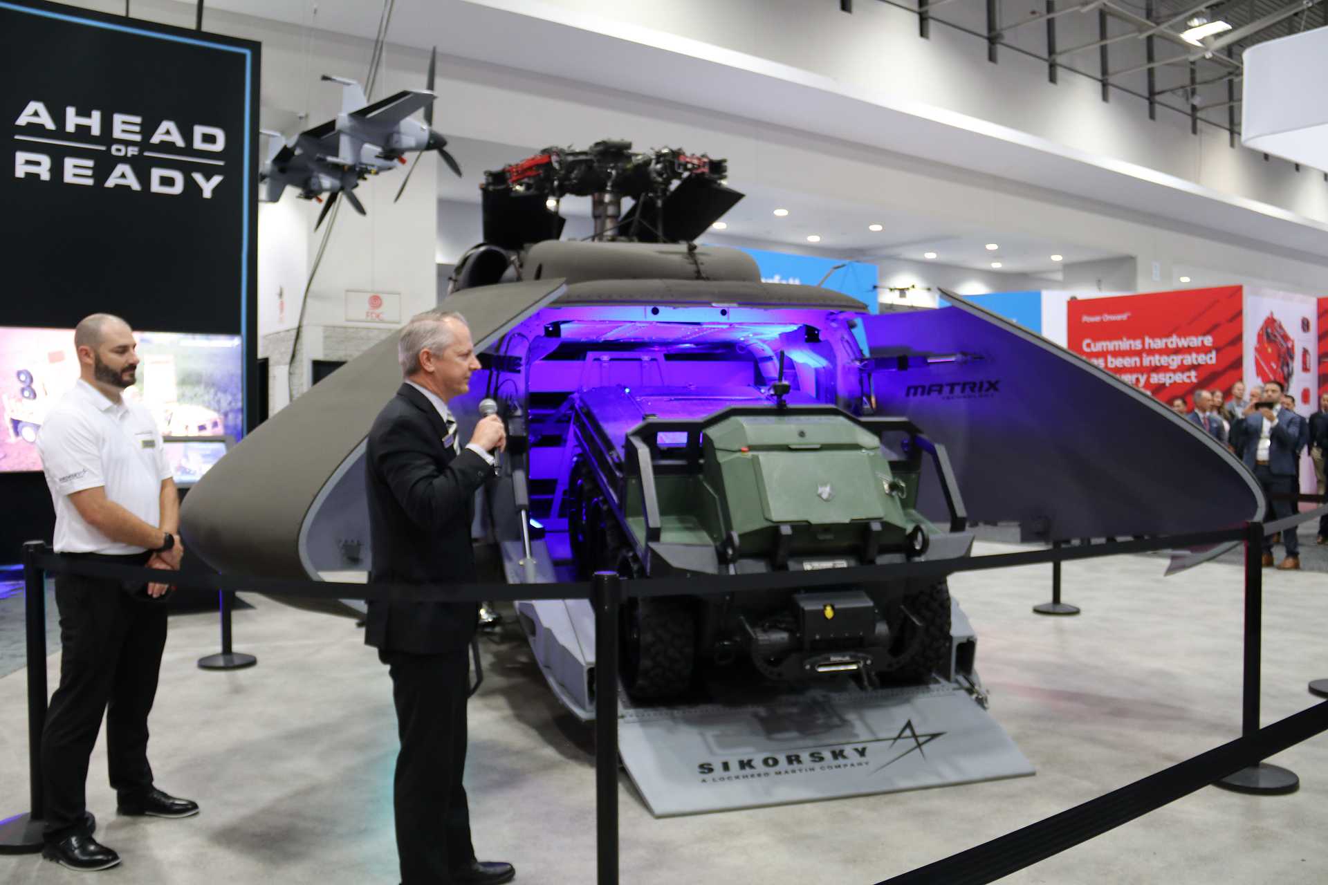 Front view of the Sikorsky S-70UAS U-Hawk unmanned helicopter unveiled at AUSA 2025, showing the fully removed cockpit section replaced by a forward cargo bay with actuated clamshell doors and integrated loading ramp.