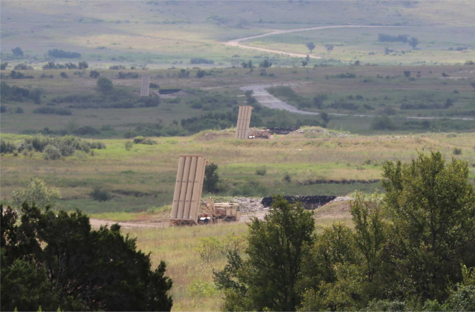 U.S. Army Terminal High Altitude Area Defense (THAAD) launchers assigned to Bravo Battery, 62nd Air Defense Artillery Regiment, are staged during training at Fort Cavazos, Texas, on July 24, 2024. THAAD is among the Army’s existing missile-defense capabilities that could contribute to the emerging Golden Dome homeland defense architecture, although the service has not identified the air-defense battalion selected for initial Golden Dome experimentation.