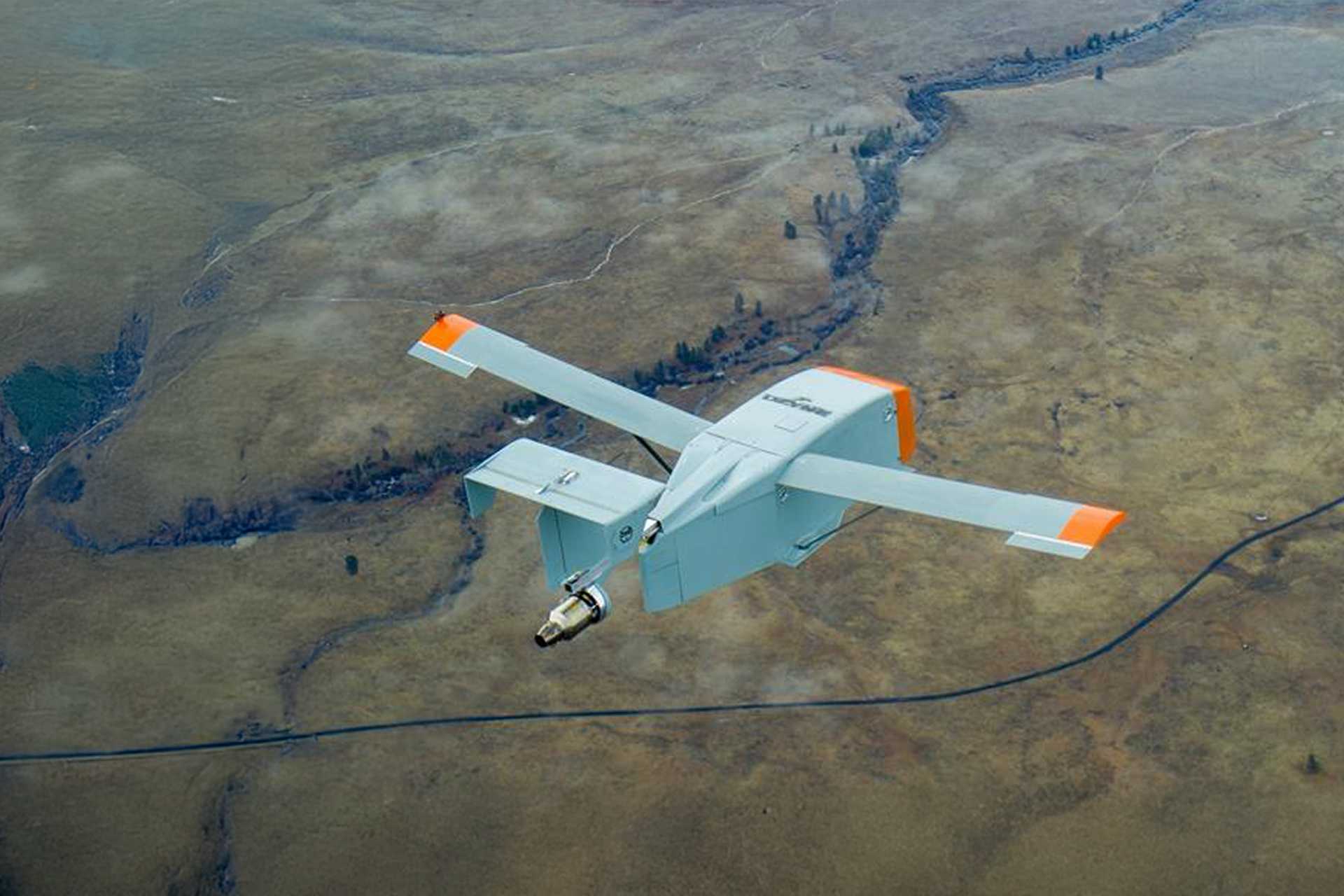 The Long-Range Grasshopper was developed because users of the original unpowered Grasshopper glider wanted to release the cargo much farther from the target, leading Dzyne and AFRL to integrate a turbine propulsion. (Picture source: Dzyne Technologies)