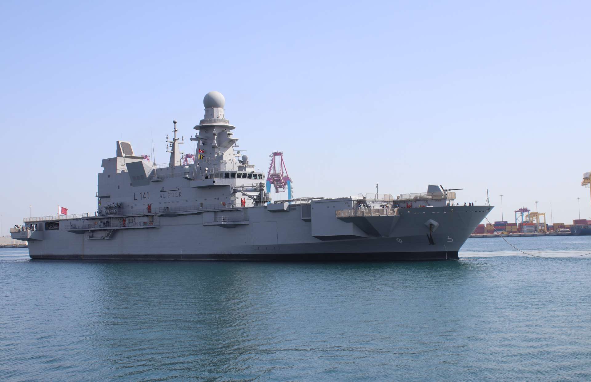 Al Fulk (L141) is Qatar’s amphibious flagship, able to embark troops and vehicles, operate NH90 helicopters, launch landing craft, and provide fleet air and missile defense with long-range radar and Aster 30 missiles (Picture source: Army Recognition Group).