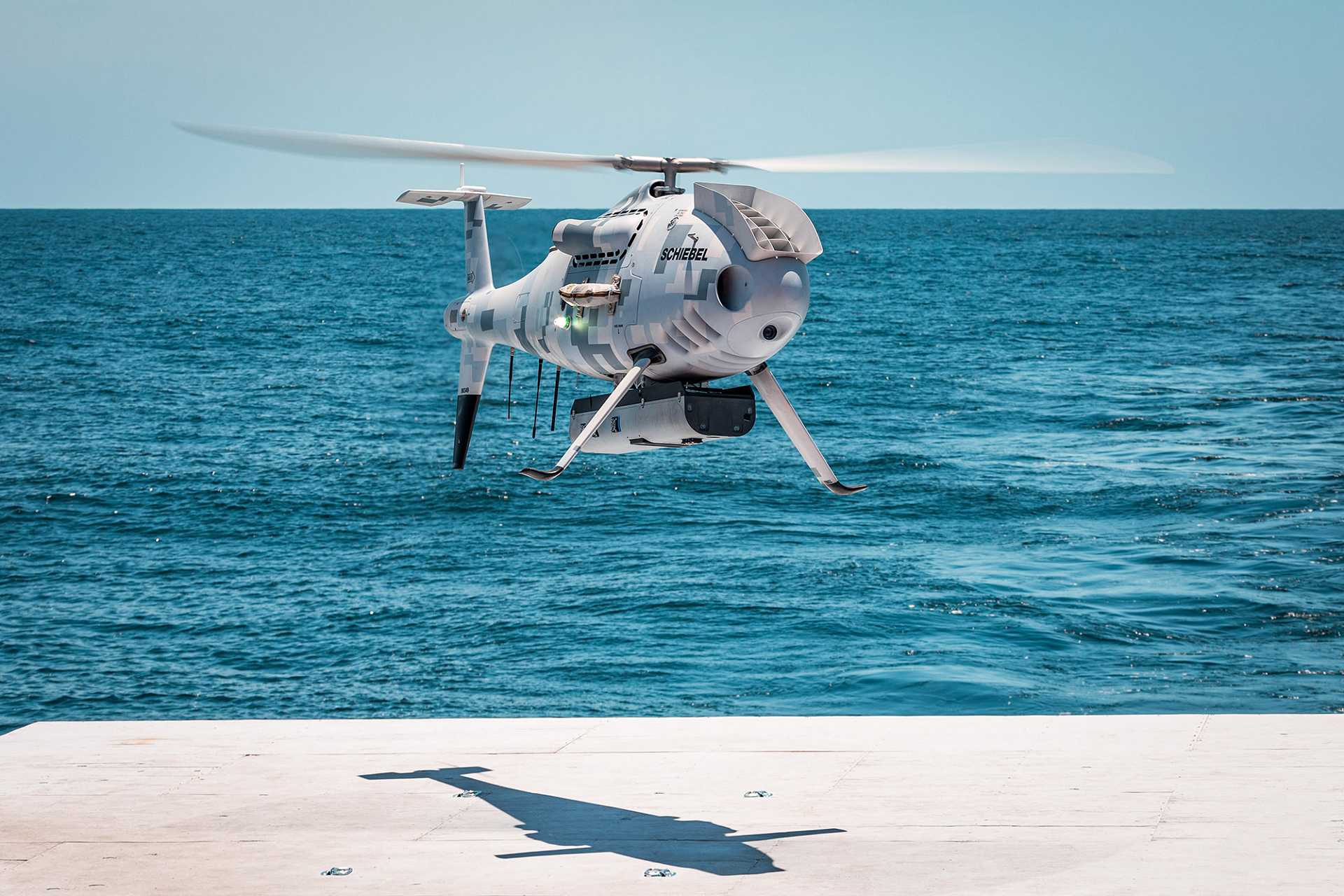Schiebel CAMCOPTER S-100 unmanned rotary-wing aircraft equipped with Wescam MX-10 EO-IR sensor and maritime surveillance payload, the system selected to equip the Hellenic Navy’s FDI Belharra-class frigates for extended ISR and EEZ monitoring missions.
